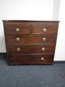 A Victorian inlaid mahogany five drawer chest