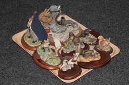 A tray containing nine Border Fine Arts figures,