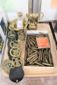 A tray of assorted brass ware,