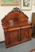 A Victorian mahogany chiffonier, width 121 cm.