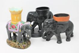 A Victorian majolica spill vase in the form of an elephant, height 20cm,