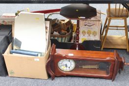 A mahogany pedestal wine table together with a highlands eight day wall clock, assorted pictures,