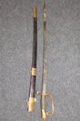 A cavalry sword in scabbard