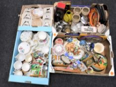 Three boxes containing assorted tea china, figurines, storage jars, vintage tins,