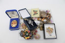 A collection of costume jewellery, Aynsley brooch etc.