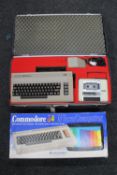 A Commodore 64 pc in a fitted Rotronics case together with original box