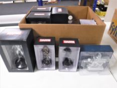 A box containing Eaglemoss figures including Marvel Guardians of the Galaxy,