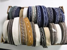 A box containing a quantity of vintage Silver Cross pram trim