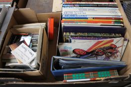 A box of 1970's children's annuals, first day covers, postcards,