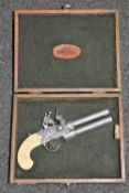 A replica Twigg of London flintlock style pistol in case