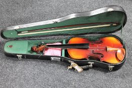 A cased Chinese violin and bow