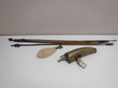 A horn powder flask, together with a shot pouch and 4 tribal arrows.