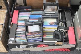 A box and four drawer storage chest containing CD's various