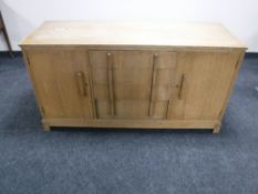 A mid twentieth century oak sideboard