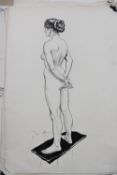 John Armstrong : Nude study of a female standing on a black mat, pen and ink, 56 cm x 38 cm,
