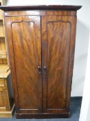 A Victorian mahogany compactum wardrobe CONDITION REPORT: Minor veneer losses and