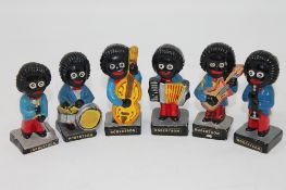 A group of six Robertson's golly band figures