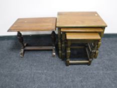 A nest of three oak tables together with an oak refectory coffee table