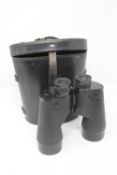 A pair of military issue binoculars marked REL/Canada 1944, C.G.B. 57 G.A.