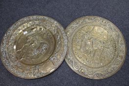 Two brass embossed wall plaques,