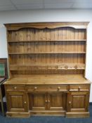 A pine farmhouse four door dresser