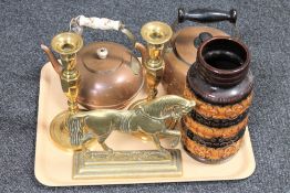 A tray of two antique copper kettles, pair of brass candlesticks, brass horse door stop,