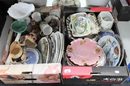 Two boxes of antique pottery jugs, Wade decanter, large collection of wall plates,