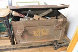 A metal ammunition box, containing a quantity of assorted hand tools,