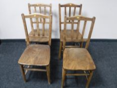 A set of four antique elm kitchen chairs