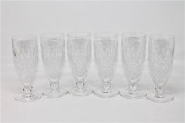 A set of six Waterford Crystal champagne flutes, height 15 cm.
