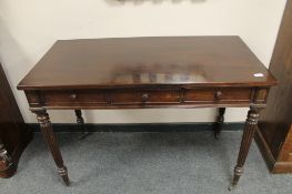 An early Victorian rosewood side table, width 110 cm.