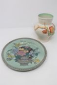 A Clarice Cliff Ophelia Newport Pottery plate together with a Clarice Cliff ribbed vase