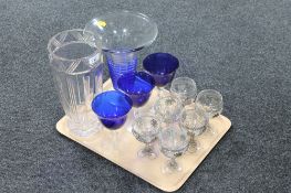 An Eastern European lead crystal vase together with a studio glass vase, three blue glass goblets,