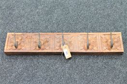 An eastern hardwood five hook coat rack