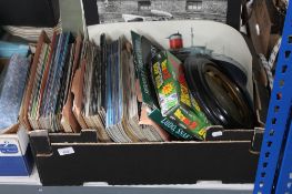 A box of board games, framed and unframed prints,