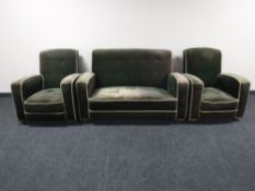 An early twentieth century three piece lounge suite upholstered in green buttoned dralon