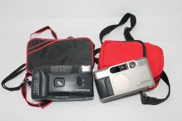 A Contax T2 Data Back, Carl Zeiss Sonnar 2.8/38T, together with an Olympus Trip S.