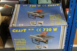 A boxed Powercraft bench type circular saw