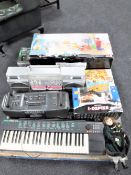 A Thomas the Tank Engine motorised track master together with assorted toys, two ghetto blasters,