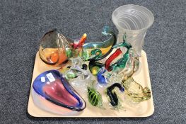 A tray of studio glass bowls, glass animal figures,
