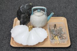 A nineteenth century teapot together with a Canadian inuit carving height 21 cm,