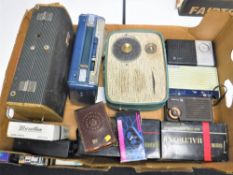 A box of eleven assorted transistor portable radios and one valve set