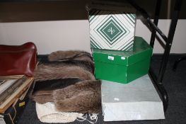 A vintage fur coat together with a boxed wedding dress and two hat boxes containing bags and hats