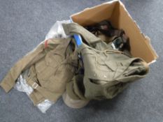 A collection of British military uniforms, caps, WWII helmet, water bottle, webbing kit bag etc.