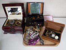 A tray of jewellery boxes and large quantity of costume jewellery