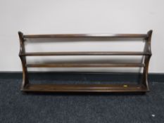 An Ercol wall shelf