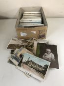 A box of early twentieth century and later topographical and subject postcards