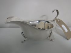 A silver sauce boat