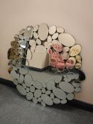 An all glass pebble mirror