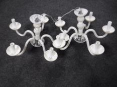 A pair of Italian glass five branch chandeliers
